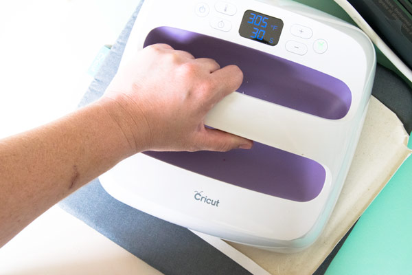 Have you been wondering how to use the Cricut Iron-On Vinyl? I'm sharing my tips and tricks to easier use the material. #cricutmade #cricut
