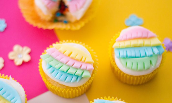 Create the perfect piñata cupcakes for your next southwestern party or Cinco De Mayo. #pinatafood #mexicanparty #cincodemayo
