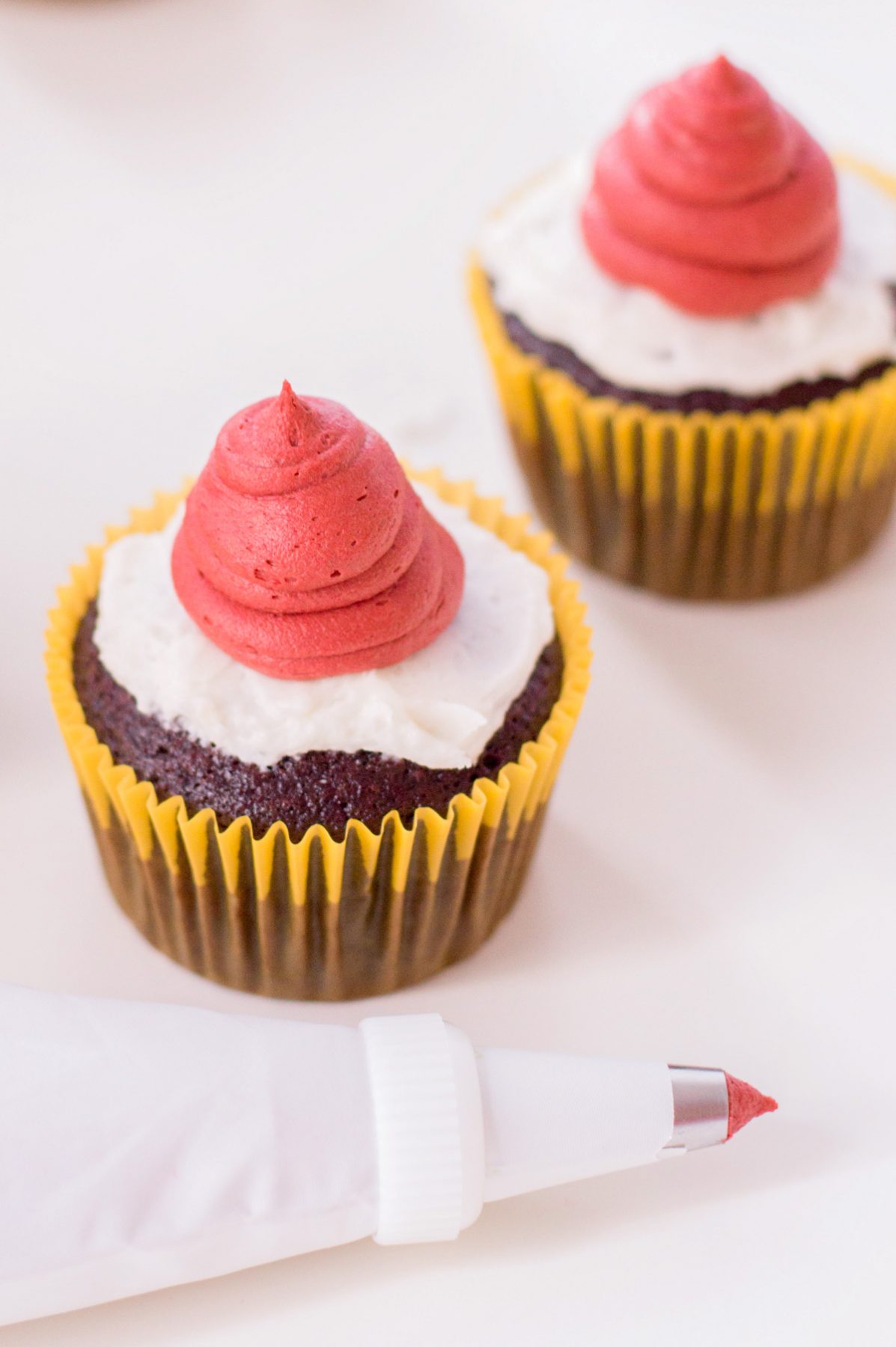 dollop of red frosting to mimic a Santa hat