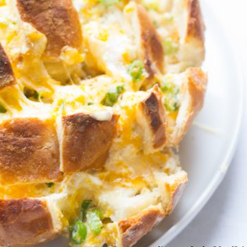 Pair this cheese bread for any delicious Italian or American meal. It's a cheesy onion bread with tons of butter, what can go wrong?