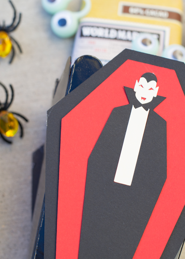 Make this easy Halloween craft using a popcorn box and a cut file.