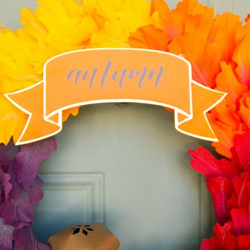 Make this homemade DIY Fall Wreath with crepe paper leaves and paper acorns. #cricutmade #xyron #colorbox
