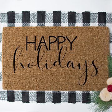 DIY doormat for Christmas that says Happy Holidays