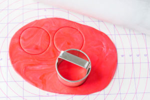 red fondant for poke ball cupcake
