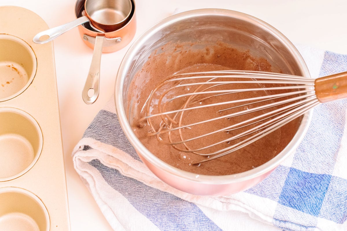 mixing chocolate cupcake batter